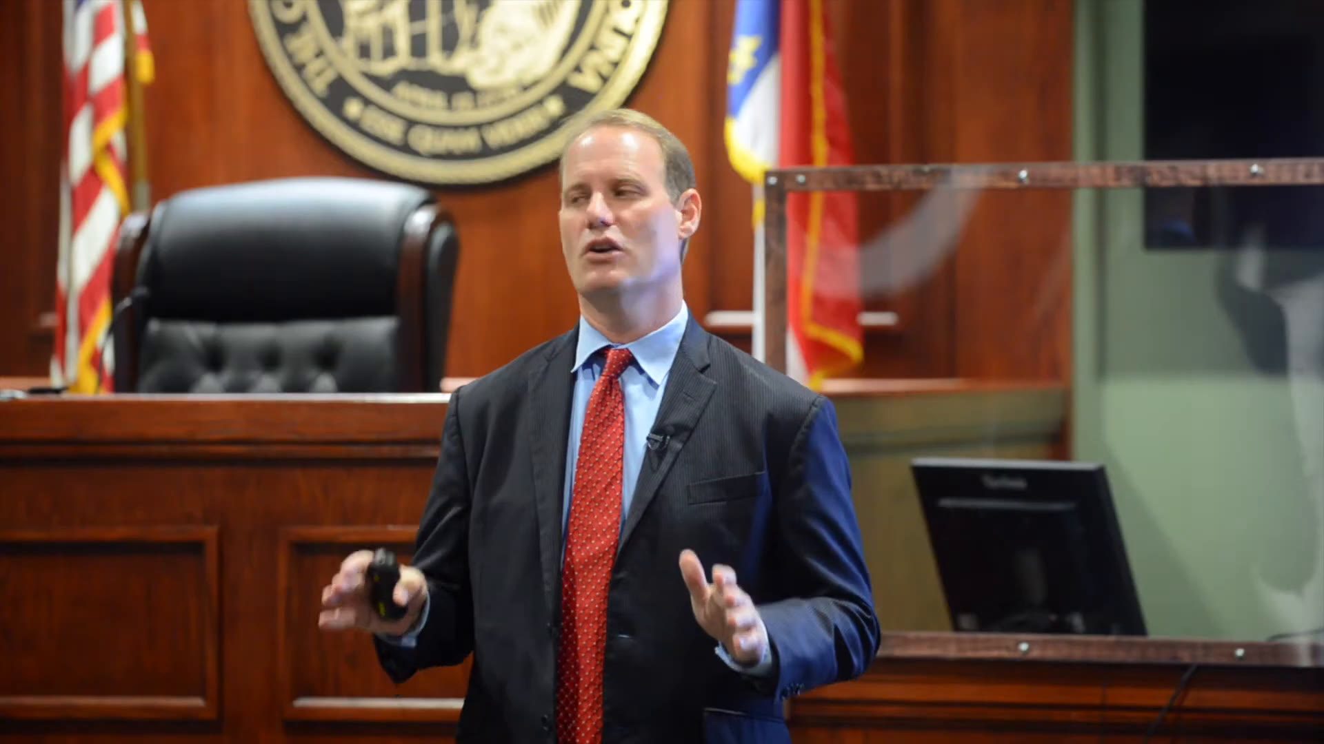 Ben David addressing a courtroom.