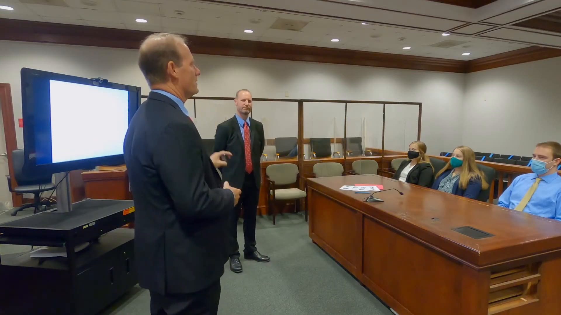 Ben and Jon David presenting to a jury.